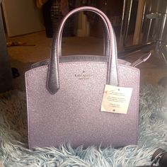 Brand New Never Used Been Used. The Shimmer Bag Of Your Dreams. A Perfect Lilac Purple. This Bag Is A Statement Piece. Buy It For Yourself Or Gift It To A Loved One. Whoever Is The Recipient Of This Beautiful Bag Will Be Very Happy!!! Elegant Kate Spade Glitter Bags, Kate Spade Purple Evening Bag, Silver Handbag, Kate Spade Satchel, Kate Spade Cameron Street, Vintage Kate Spade, Bags Kate Spade, Black Leather Satchel, Brown Leather Shoulder Bag