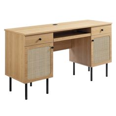 a wooden desk with two wicker baskets on the top and one drawer open to reveal an office space