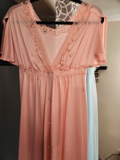 "1970s Vintage Empire Waist Shadowline Dressing Gown/Robe. Size Small, Made in USA, Pink, V Neck, Split short sleeves.  Covered Buttons, Snap at bodice. Bust 32\" Waist 32\" Hips 44\" Length 55\"" Vintage V-neck Sleep Dress, Vintage V-neck Nightgown For Spring, Spring Vintage V-neck Nightgown, Retro Dresses With Lace Trim For Loungewear, Retro Loungewear Dresses With Lace Trim, Retro Sleep Dress With Lace Trim, Dressing Gown Robe, Soft Bra, Womens Robes