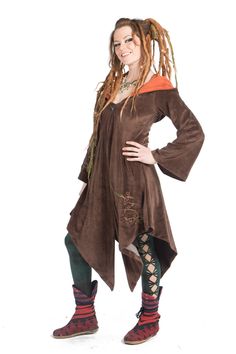 "A graceful, flowing velvet jacket fit for a faery goddess. Angel sleeves, pixie points on the hem and a large hood. Beautifully embroidered with plant patterns. Lined with light floaty Indian cotton.   SIZES  SMALL: Bust: 33.5\" (85 cm) Waist: 30\" (76 cm) Arm: 23\" (58 cm) Length: 47\" (119 cm) MEDIUM: Bust: 35.5\" (90 cm) Waist: 32\" (81 cm) Arm: 24\" (61 cm) Length: 48\" (122 cm) LARGE: Bust: 37.5\" (95 cm) Waist: 34\" (86 cm) Arm: 25\" (64 cm) Length: 49\" (124 cm) XL: Bust: 39.5\" (100 cm) Elvish Long Sleeve Costume Outerwear, Fantasy Hooded Outerwear For Fall, Fantasy Hooded Fall Outerwear, Elvish Style Long Sleeve Costume Outerwear, Witchy Long Sleeve Costume Outerwear, Witchy Long Sleeve Outerwear For Costume, Fantasy Costume Outerwear With Long Sleeves, Fantasy Outerwear For Fall Events, Fall Fantasy Outerwear For Fantasy Events