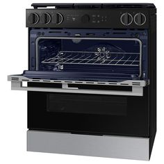 an oven with the door open and its light on, in front of a white background