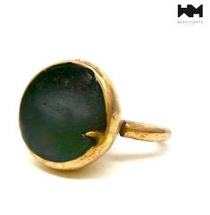 This one of a kind ring was first carved in wax and casted in bronze. It reminds me a bit of Aladdin's lamp, don't ask me why. The shape I came out with is just so peculiar. As you can see It was hollow and I applied a patina inside to get the green tones to then fill it with epoxi resin to get this effect. It is like a lake, a natural pool where you would like to jump in. It is and adjustable ring with quite a sturdy band so you would have to tell me your size so I could make it right for you s Aladdin Lamp, Natural Pool, Everyday Rings, Jump In, Green Tones, Adjustable Ring, Adjustable Rings, Statement Ring, Rings Statement