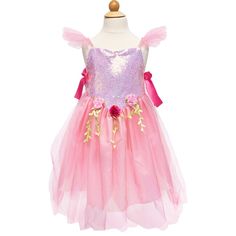 Great Pretenders Forest Fairy Tunics are iconic designs with extra size flexibility! This elegant design is the perfect choice for the little fairies and magical transformation! Made with sparkly sequined top, embellished with a heart gem, and with soft shoulder straps adorned with lovely capped sleeves, this is the best costume for our little fairies. The waistband is adorned with three hand crafted roses with neatly flowing green leaves. These tunics fit easily over the head and tie on the sides with elegant satin ribbons. The lining is topped with matching tulle on the skirt, which adds glamour to this layered skirt that’s soft, comfortable, and perfect for twirling and dancing around! All Great Pretenders dress up is machine washable! | Great Pretenders | (Pink Sequins Forest Fairy Tun Pink Fairy Dress For Costume Party, Pink Fairycore Dress With Tulle Material, Pink Tulle Fairycore Dress, Fairy Style Pink Princess Dress For Dress-up, Pink Princess Fairy Dress For Costume Party, Pink Fairy Princess Dress For Spring, Pink Fairycore Dress For Costume Party, Pink Fairy Dress For Dress-up, Pink Princess Fairy Dress For Dress-up