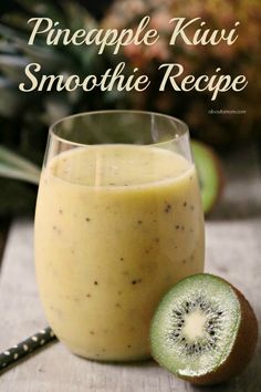 a smoothie in a glass next to a kiwi on a table with the title pineapple kawi smoothie recipe