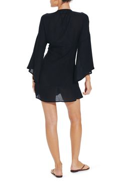 Move from beach to cocktails in this breezy cover-up designed with a gathered and twisted front for stylish definition. V-neck Long sleeves Lined 100% cotton Hand wash, dry flat Made in Brazil Latinx Owned/Founded Vix Swimwear, Long Sleeve Swimwear, Eyelet Shorts, Black Swimwear, Made In Brazil, Cover Up Dress, Nordstrom Dresses, Mini Black Dress, Swim Shorts