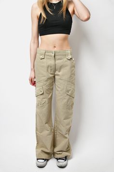 Trussardi Jeans cargo multi pocket pants in beige colour. Size - M/L (44 IT size on the tag). Model is slender and 172 cm / 5ft 7.7" tall. Usually wears size XS/S. New perfect condition with tags. Flat measurements: Length - 42.5" / 108 cm; Inseam - 32.6" / 84 cm; Hips - 20.8" / 53 cm; Waist - 14.5" / 37 cm. Only 1 available! All orders are shipped every day Worldwide from EU. Safe registered standard delivery Worldwide with courier and tracking number. You can also choose a super fast 1-4 days Y2k Straight Pants With Pockets, Y2k Style Khaki Bottoms For Spring, Spring Y2k Khaki Bottoms, Khaki High Waist Y2k Bottoms, Khaki Y2k High-waisted Bottoms, Y2k High Waist Khaki Bottoms, Khaki Full-length Cargo Jeans, Y2k Straight Cotton Cargo Pants, Y2k Style Straight Cotton Cargo Pants