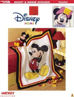 a crocheted mickey mouse blanket and pillow with the words disney home on it