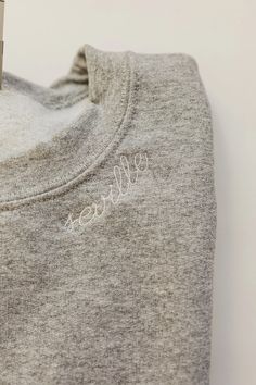 Custom Embroidered Name Sweatshirt Custom Name Sweatshirt | Etsy Long Sleeve Tops With Custom Embroidery For Everyday, Casual Loungewear Tops With Custom Embroidery, Custom Embroidered Relaxed Fit Tops For Loungewear, Custom Embroidery Loungewear Tops, Relaxed Fit Tops With Custom Embroidery For Loungewear, Crew Neck Tops With Letter Embroidery For Loungewear, Gray Embroidered Winter Tops, Everyday Long Sleeve Tops With Letter Embroidery, Winter Loungewear Tops With Letter Embroidery