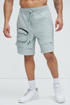 Available In Grey. Drawstring Elastic Waist Side Hand Pockets 1 Zipper Pocket Utility Pockets Back Pocket Shell: 100% Nylon Imported | Mens Safe Side Utility Nylon Shorts in Grey size 3XL by Fashion Nova Nylon Athleisure Shorts With Cargo Pockets, Nylon Athleisure Cargo Shorts, Sporty Nylon Cargo Shorts, Relaxed Fit Nylon Cargo Shorts With Pockets, Sporty Nylon Cargo Shorts With Elastic Waistband, Relaxed Fit Nylon Cargo Shorts, Casual Nylon Cargo Shorts For Sports, Summer Nylon Shorts With Multiple Pockets, Nylon Cargo Sports Shorts With Pockets