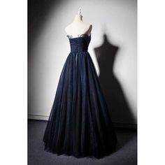 This Navy Blue Gauze Sequins Ball Gown is the perfect choice for any special occasion. This stunning formal dress is made from a lightweight and airy gauze fabric, adorned with shimmering sequins throughout. The top features a classic scoop neckline, with a fitted bodice and cap sleeves. The full skirt is gathered and drapes gracefully down to the floor. The back of the dress is finished with a zipper closure and a dramatic train. The dress is also available in plus sizes, providing the perfect Navy Blue Evening Dress, Prom Dress Navy Blue, Prom Dress Navy, Sequin Ball Gown, Blue Evening Dress, Wedding Cardigan, Navy Blue Prom Dresses, Color Rush, Blue Evening Dresses