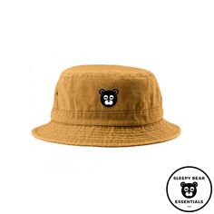 Summer is here, and it's time to protect that head of yours. This stylishly designed bucket hat gives off those summer vibes all while providing cloud-like comfort. Throw on some shades and hit the beach looking cool as a cucumber with our badass sleepy bucket hat. Features Fabric sweatband Roll up shape Unisex Vintage dyed look 4 Brass Eyelets Self-fabric Sweatband Embroidered patched Logo (1.5x1.5) Size Chart Crown Height 8.5 CM Brim Length 4.5 CM For environmental reasons, this Product is mad Casual Bucket Hat For Vacation, Summer Brimmed Streetwear Hats, Brimmed Hats For Summer Streetwear, Brimmed Streetwear Hats For Summer, Summer Streetwear Brimmed Hats, Casual Flat Brim Bucket Hat For Summer, Summer Streetwear Sun Hat With Curved Brim, Curved Brim Sun Hat For Summer Streetwear, Wide Brim Sun Hat For Summer Streetwear