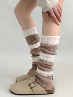 Stay cozy and stylish with our 3 color options knit leg warmers. These versatile leg warmers come in three beautiful colors to match any outfit. Whether you're pairing them with boots, leggings, or skirts, these leg warmers are the perfect accessory to complete your look.   Please note that this product includes one pair of leg warmers only. Choose your favorite color and step up your fashion game with these trendy leg warmers. Cozy Beige Leg Warmers For Fall, Cozy Beige Knee-high Socks For Winter, Casual One Size Acrylic Socks, Casual Soft Knit Leg Warmers For Fall, Comfortable Knee-high Leg Warmers For Fall, Trendy Warm Knee-high Socks For Fall, Casual Beige Knee-high Socks For Fall, Cozy Brown Leg Warmers For Fall, Trendy Elastic Socks For Fall