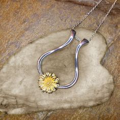 Ring Keeper Necklace - Our sunflower ring holder necklace will be a perfect necklace both as a daily decoration and also to hold your ring.Unique Design - The sunflower design makes the necklace more lovely, with a positive and optimistic attitude.Practical Ring Holder Necklace - You can keep the ring shiny and scratch-free when applying lotion, cooking, washing your hands, cleaning, crafting, or gardening.A Great Gift - For people like medical staff, fitness, chefs, and pastry chefs, who are in Ring Saver Necklace, Ring Necklace Holder, Wedding Ring Necklace Holder, Wedding Ring Necklace, Diy Necklace Holder, Ring Holder Pendant, Mom Necklace Personalized, Ring Unique Design, Ring Holder Necklace