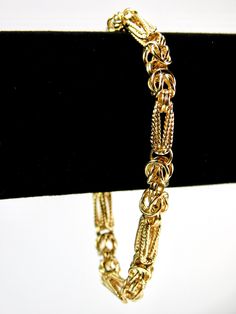 Beautiful 14K Yellow Gold Designers Rope Chain Bracelet Jewelry Attention: all jewelry is shipped with the LARGE jewelry tag.  If you remove it the item is NOT Returnable! Beautiful 14K Yellow Gold Designers Bracelet Item is gently used.  Attention international buyers!  Please check your local postal rules before buying! The transaction will be canceled if jewelry items made of gold,  diamonds, silver, etc are prohibited for shipping in your country. Antique Yellow Gold Link Bracelet, Antique Gold Jewelry With Jubilee Bracelet, Gold Oval Link Bracelet For Anniversary, Ornate Gold Bracelets For Formal Occasions, Ornate Yellow Gold Jubilee Bracelet, Antique Gold Bracelet With Lobster Clasp, Gold Anniversary Bracelet With Lobster Clasp, Victorian Filigree Bracelets In Yellow Gold, Ornate Yellow Gold Bracelets For Formal Occasions