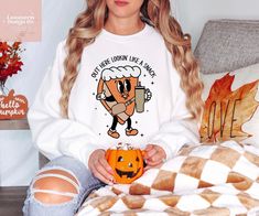 Get ready to be the center of attention with our 'Lookin Like A Snack Sweater'. This funny Thanksgiving sweater is perfect for adding some humor to your holiday wardrobe. Featuring a cute pumpkin pie design, this sweater will make you look good enough to eat! Made from high-quality materials, it is not only stylish but also comfortable to wear. Whether you're attending a Thanksgiving dinner or just want to spread some holiday cheer, this pumpkin pie sweater is sure to turn heads and put a smile Looking Like A Snack, Thanksgiving Sweater, Holiday Wardrobe, Funny Thanksgiving, Christmas Couple, Sports Mom, Camping Gifts, Cute Pumpkin, Good Enough