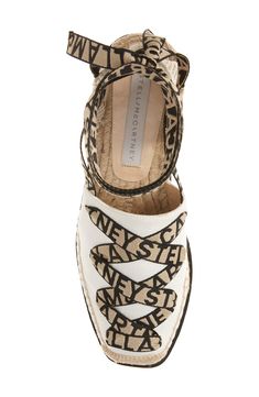 Logo-embellished laces zigzag up the toe to wrap the ankle on this elevated take on classic espadrille boosted by a wedge heel and chunky layered platform. Style Name:Stella Mccartney Gaia Logo Strap Espadrille (Women). Style Number: 6207146. Chic White Platform Espadrilles, Chic Lace-up Espadrilles, Chic Espadrilles With Textured Wedge Sole, Footwear Design Women, Women Style, Wedge Heels, Stella Mccartney, Designer Shoes, Designing Women