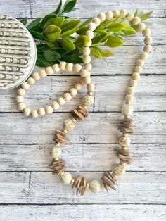 Neutral statement necklace, honey beige wood necklace, coconut chip bead, wood statement necklace. An easy necklace to add to any outfit! It measures approximately 30-31 inches. Lightweight wood and coconut chip beads with gorgeous ceramic accent beads.  Thanks for visiting BeadedBlues! Easy Necklace, Diy Jewelry To Sell, West Lafayette, Christmas Tree Earrings, Costume Necklaces, Hippie Necklace, Wooden Necklace, Wood Necklace, Earring Tree