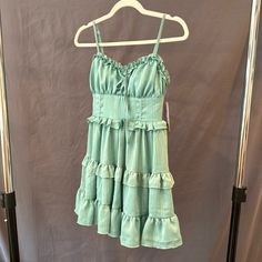 Aqua Green Wild Fable Sleeveless Short Dress With Adjustable Straps. New With Tags. Sundress With Ruffled Straps For Day Out, Sleeveless Sundress For Spring Brunch, Green Mini Sleeveless Dress With Ruffles, Green Sleeveless Mini Dress With Ruffles, Flowy Sleeveless Mini Dress With Lining, Sleeveless Summer Dress With Ruffle Hem, Sleeveless Ruffled Dress With Spaghetti Straps For Brunch, Cotton Sleeveless Ruffled Mini Dress, Sleeveless Cotton Mini Dress With Ruffles