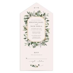 a wedding card with greenery on it