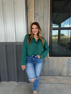 Stay cozy and stylish in our Hunter Zip-Up Crop Sweatshirt. With a defined collar and long drop-shoulder sleeves, this solid knit sweatshirt features a half-zip neckline and kangaroo pocket for added convenience. The cropped silhouette adds an edgy touch. Perfect for any casual occasion! Shelby is 5'4" and wearing a size Small. - True to size- Middle pocket- French Terry Lining Fall Half-zip Loungewear Sweater, Half-zip Sweater For Fall Loungewear, Fall Half-zip Sweater For Loungewear, Cozy Fit Half-zip Fall Sweater, Cozy Fit Half-zip Fall Sweatshirt, Fall Loungewear Half-zip Tops, Fall Half-zip Top With Ribbed Collar, Half-zip Tops With Ribbed Collar For Fall, Green Half-zip Fall Sweater