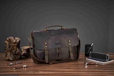 Full Grain Rustic Leather Messenger Bag, Leather Laptop Bag, Men Briefcase Satchel Crossbody Bag, Father's Gift, Valentines Day Gift for Him Two sizes to choose: S size: 14.5"L x 4.3"W x 11"H / 37cm(L) x 11cm(W) x28cm(H) L size: 16.5"L x 4.3"W x 11.8"H / 42cm(L) x 11cm(W) x30cm(H) Personalization We can engrave any picture, initials, name, or logo etc on any location.  Please send picture with Etsy message and leave a note at checkout with what you would like personalized on. Features: 1. Long A Portable Leather Briefcase For Daily Use, Portable Leather Bag As A Gift, Functional Leather Bag As Gift, Functional Leather Bag Gift, Leather Bag For Gift, Handmade Leather Laptop Bag, Leather Overnight Bag, Men Briefcase, Weekend Duffle Bag