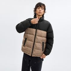 100% recycled polyester Lining: 100% polyester Fill 1: 90% down 10% feathers Fill 2: 100% polyester Zip closure Snap pockets Length: 28 1/2 Machine wash Model is 6'2 (188cm) and wears a size M Style No. CU798 Brown Puffer Jacket With Padded Collar For Outdoor, Casual Duck Down Outerwear With Padded Collar, Casual Duck Down Outerwear For Fall, Sporty Duck Down Outerwear For Fall, Casual Duck Down Outerwear For Spring, Casual Spring Duck Down Outerwear, Fall Puffer Jacket With Padded Collar For Outdoor Activities, Brown Nylon Outdoor Outerwear, Brown Nylon Outerwear For Outdoor