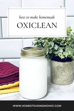 there is a jar with some towels next to it and the words how to make homemade oxiclean