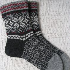 "Knit socks. Knitted socks for men. Norwegian pattern. When we hear the word \"wool\" we have a feeling of warmth, comfort, softness. And no wonder! After the wool yarn has long been considered therapeutic. Wool is resistant to crease perfectly drawn and hygroscopic. . Wool socks today sufficiently studied to argue that they have excellent healing qualities: chemical, heating, electrostatic, moisture management and a massage. Wool socks are not only warm, pleasant, soft, but also affect our body Nordic Knitted Winter Socks, Winter Nordic Knitted Socks, Cozy Winter Socks With Fair Isle Pattern, Nordic Warm Winter Socks, Comfortable Winter Socks With Fair Isle Pattern, Scandinavian Style Winter Socks With Fair Isle Pattern, Comfortable Fair Isle Pattern Winter Socks, Nordic Style Winter Socks For Gift, Hand Knitted Nordic Style Winter Socks