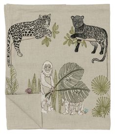 an image of a scarf with animals and plants on it's side, including a leopard