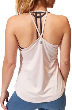 Work out or chill out in this breathable tank crafted from lightweight stretch jersey with a sleek racerback. Scoop neck   Racerback   90% recycled polyester, 10% spandex   Machine wash, tumble dry   Imported Racerback Tank Top With Built-in Bra And 4-way Stretch, Casual Cross Back Tank Top With Built-in Bra, Casual Tank Top With Built-in Bra And 4-way Stretch, Casual Tank Top With Built-in Bra And Strappy Back, Summer Tank Top With Built-in Bra For Light Exercise, Versatile Activewear With Mesh Racerback, Spring Sports Tank Top With Built-in Bra, Racerback Tank Top For Yoga With 4-way Stretch, Sports Tops With Built-in Bra And Strappy Back