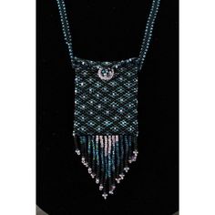 Artisan Jewelry Beaded WICCA Amulet Bag Aqua Blue Pattern Necklace Liz Schwartz. Hand crafted one of a kind piece. 26" long strap.  The pouch is 2.5" by 2" and the fringe is 2" long. Woven seed glass beads. Long flap in the front.  Be an original. Great for a water witch. Everyday Beaded Necklaces With Round Beads, Everyday Round Beaded Necklaces With Lobster Clasp, Handmade Beaded Necklaces With Round Beads For Everyday, Handmade Round Beads Jewelry For Everyday Use, Handmade Jewelry With Round Beads For Daily Use, Everyday Beaded Necklaces, Bohemian Rectangular Necklaces For Everyday Use, Bohemian Rectangular Necklace For Everyday Use, Bohemian Rectangular Necklace