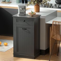 a small kitchen island in the middle of a room