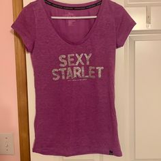 Nwot Victoria Secret T-Shirt Glitter And Rhinestones Victoria's Secret Crew Neck T-shirt, Victoria's Secret Pink Letter Print Top, Victoria's Secret Pink Tops With Letter Print, Pink Letter Print Top By Victoria's Secret, Victoria's Secret Casual Graphic T-shirt, Victoria's Secret Casual Graphic Print T-shirt, Cotton Glitter Print T-shirt, Graphic Tee With Glitter Print And Short Sleeves, Cotton Short Sleeve Tops With Glitter Print