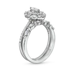 a white gold engagement ring set with diamonds