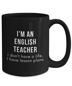 a black coffee mug that says i'm an english teacher, i don't have