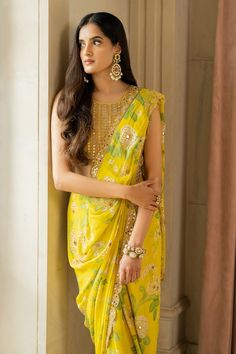 Lime yellow crepe pre-draped saree with floral print and mirror, sequins and thread embroidery. Comes with a cotton silk padded blouse. - Aza Fashions Yellow Bollywood Pre-draped Saree, Yellow Pre-draped Saree For Transitional Wedding Season, Yellow Chinon Pre-draped Saree, Embellished Chanderi Blouse With Traditional Drape, Embellished Chanderi Pre-draped Saree, Transitional Yellow Chanderi Pre-draped Saree, Yellow Traditional Wear For Transitional Party, Yellow Traditional Wear For Party During Transitional Season, Yellow Pre-draped Saree With Cutdana