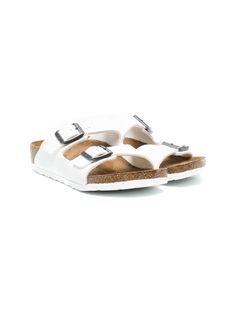 Bright white leather Arizona leather sandals from BIRKENSTOCK KIDS featuring open toe, side buckle fastening, branded insole and flat rubber sole. | Birkenstock Kids Arizona leather sandals White Birkenstocks, Kids Sand, Sandals White, Flat Boots, Open Toe Sandals, Ballet Flat Shoes, Boot Sandals, Boys Shoes, White Leather