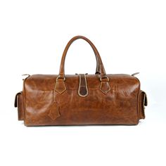 Discover the epitome of luxury and craftsmanship with our Premium Handcrafted Vintage Leather Travel Bag. We believe in only the finest quality, which is why we meticulously select the best Full grain leather for this exquisite creation. Every inch of this bag exudes sophistication and durability, making it the ideal companion for your journeys. Finest Quality Leather: We pride ourselves on sourcing the highest quality leather available. This leather not only adds a touch of elegance but also en