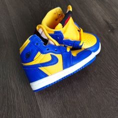 Brand New No Original Box Size 2c Or 4c Toddler Baby (Please Choose Correct Size) Brand Nike Air Jordan Model Air Jordan 1 Reverse Laney Style # Fd2598-700 Colorway Blue Yellow / White Soles Yellow Synthetic Jordan Sport Shoes, Yellow Synthetic Jordan Sporty Shoes, Blue Custom Sneakers For Training, Yellow Synthetic Jordan Shoes, Yellow Sporty Jordan Shoes In Synthetic Material, Yellow Synthetic Jordan Shoes For Streetwear, Blue Low-top Jordan Training Shoes, Blue Low-top Jordan Shoes For Training, Yellow Sporty Jordan Shoes