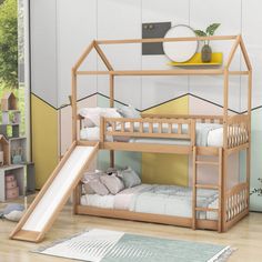 a metal bunk bed with a slide in front of it and other furniture on the floor