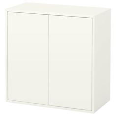 a white cabinet with two doors is shown