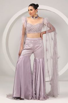 Lilac padded blouse with sequin, bead, thread, crystal embroidery in stripe pattern and faux feather detailing on shoulder sleeve. Paired with satin organza gharara. - Aza Fashions Satin Gharara, Purple Choli, Fish Cut Skirt, Organza Gharara, Fish Cut, Pink Peplum Top, Crystal Embroidery, Padded Blouse, Drape Sleeves