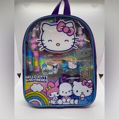 Adorable Sanrio Hello Kitty And Friends Ensamble Cosmetics Bag! The Bag Is 11" Tall, 9" Width, 1.5" Dimension Not Expanded And 2.5-3" Expanded. The Bag Includes 2 Lip Balms, 2 Nail Polishes, 1 Lip Gloss, 1 Compact, 1 Sheet Of Nail Stickers, 1 Brush, 1 Bag, 1 Nail File, 2 Hair Bows, And More! Perfect For Any On The Go Touch Ups Or To Expand Your Beauty Collection! Bag Features All Around Zip And Adjustable Straps. Beautiful Purple Color And Pattern Featuring Various Sanrio Characters. Officially Kawaii Multicolor Bag For End Of School Year, Kawaii Hello Kitty Bag For Back To School, Kawaii Multicolor Bags For Back To School, Playful Purple Backpack Bag, Multicolor Hello Kitty Print Backpack, Trendy Hello Kitty Print Bag For Back To School, Trendy Hello Kitty Print Back To School Bag, Everyday Multicolor Hello Kitty Backpack, Kawaii Multicolor Cat Design Bag