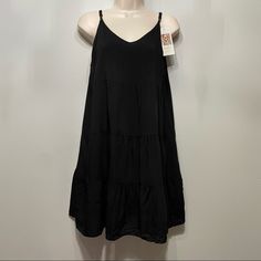 Womens Empire Waist Dress Black V Neck Tiered Summer Spaghetti Strap Viscose Sm Brand: Kirundo Size: Small Color: Black Condition: New With Tags, Nwt Description: Adjustable Straps And A 90s Y2k. Feel. Perfect Mini Spaghetti Strap Summer Dress That Features V-Neck With Tiered Flounce. 100% Viscose Perfect Dress That Can Go From Casual To Career Or Maternity. Approximate Measurements: Bust: 35” Adjustable Straps: 6-12” Total Length: 33-36” Black Sleeveless Slip Dress For Vacation, Black Sundress With Adjustable Straps For Brunch, Black Mini Length Slip Dress For Beach, Spaghetti Strap Sundress In Rayon, Black Sundress With Adjustable Straps, Black Cami Dress For Vacation, Black Summer Sundress With Adjustable Straps, Black Casual Cami Dress, Casual Black Cami Dress