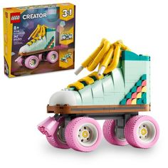 a toy roller skate with bananas on the top and pink wheels, in front of a box