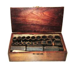 an old wooden box filled with lots of tools