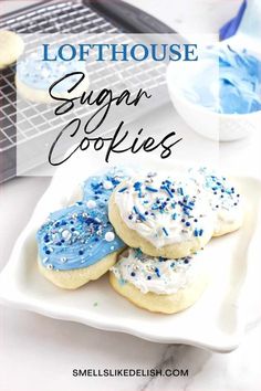 blue and white frosted sugar cookies on a plate