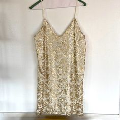 Flowy Mini Dress (But Not Too Short) Beautiful! Never Worn, Retailed For Almost $200 A Number Of Years Back, Adjustable Straps, Cream Color And Gold. Gold Mini Dress For Summer Brunch, Gold Spring Mini Dress For Brunch, Gold Mini Dress For Spring Brunch, Gold Summer Holiday Dress, Gold V-neck Mini Dress For Spring, Gold Mini-length Summer Dress, Gold V-neck Mini Dress For Party, Champagne V-neck Mini Dress With Sequins, Metallic V-neck Mini Dress With Sequins