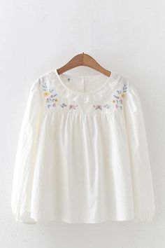 Clothing Length: regular Decoration: Embroidery Elasticity: Non Stretch Sleeve Style: regular Fabric Type: Broadcloth Material: cotton Pattern Type: Solid Tops Type: TEES The fabric name: cotton The main content of fabric content: 51%-70% style: embroidered Sleeve length: Long sleeve Get model: Round collar White Top Embroidery Design, Cute Modest Tops For Women, Crew Neck Blouse With Floral Embroidery, Casual Embroidered Cotton Blouse, Casual Cotton Blouse With Embroidery, Casual Cotton Embroidered Blouse, Casual White Blouse With Floral Embroidery, Casual Cotton Embroidered Crew Neck Top, Embroidered Crew Neck Blouse