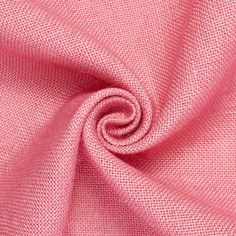 the pink fabric is very soft and has an interesting pattern that makes it appear to be woven